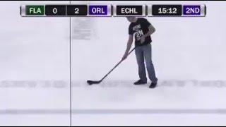 ***AMAZING Hockey Shot*** Hockey Fan makes a nearly-impossible shot and wins $100,000!