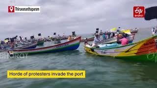 Vizhinjam port surrounded by fishing boats from sea, protestors break open main gates