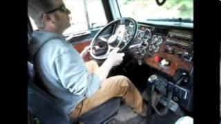 Clutch free shifting down a logging road and Jaking Peterbilt logger.