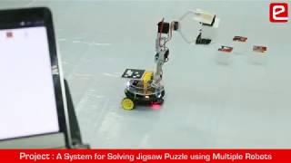 eYSIP 2018: A System for Solving Jigsaw Puzzle using Multiple Robots