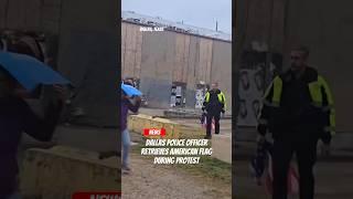 Dallas Texas police officer retrieves flag thrown on ground at immigration protest