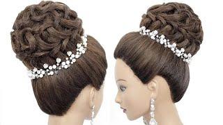 High bun updo. Hairstyle for long hair