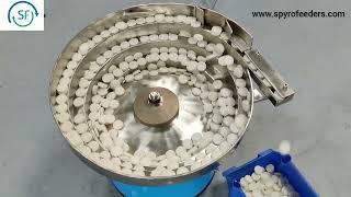 Vibratory bowl feeder for White foam plug component - Spyrofeeders