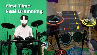 VR drummer tries to play a real drum for the first time.