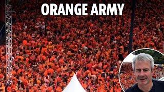 Dutch fans go wild as electric atmosphere builds ahead of Euro semi-final against England