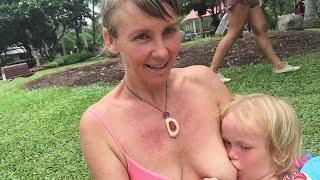 Public Breast feeding, four year old gets both breasts out!