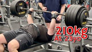 Squat everyday Day 1824: 210kg Bench press at 23