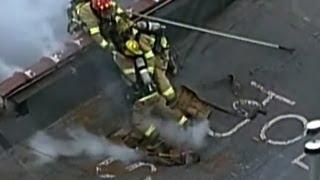 CBS This Morning - Roof collapse close call for firefighters