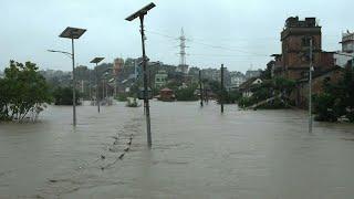 Torrential rain triggers deadly flooding in Nepal | AFP