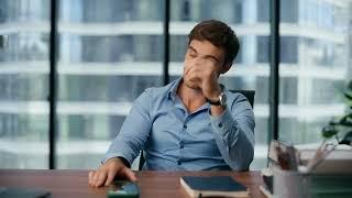 Tired office Businessman working thinking | sitting stressed - 4K | Free Stock footage | FINDSTOCKS