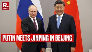 Russian President Putin Arrives In Beijing, Meets Xi Jinping In Show Of Power