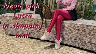 Anna in pink shiny spandex pantyhose walking in shopping mall