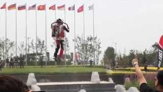 Human flying with jet pack in Beijing
