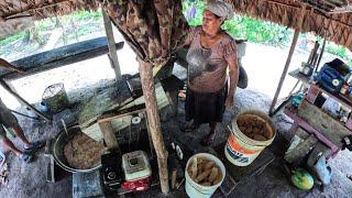 VILLAGE LIFE MAKING CASSAVA BREAD and FISHING.