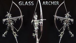 Glass blower blowing art Did you buy a glass archer at the Dunster Archery Week?