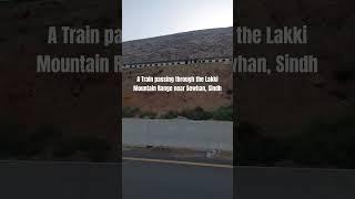 A Quetta to Karachi Train passing through the Lakki Mountain Range near Sewhan, Sindh