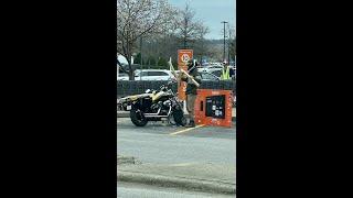 Guy picks up TV with motorcycle!