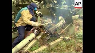 Bosnia - SFOR troops destroy heavy weaponry