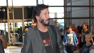 Keanu Reeves Takes Tons Of Photos For Fans On His 51st Birthday