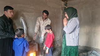 "Fixing the heater of Asmat house by master Hossein and Yasin"