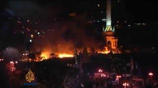 Euromaidan - Ukrainian protest camp is on fire while riot police attack in Kiev Ukraine