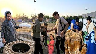 Documentary of the Ali family finishing the bakery oven, baking bread and hosting the master builder