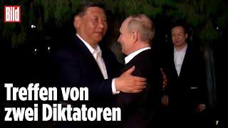 Putin in China: Plötzlich umarmt Xi den russischen Präsidenten