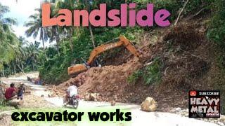 Landslide , excavator works , Heavy metal operator