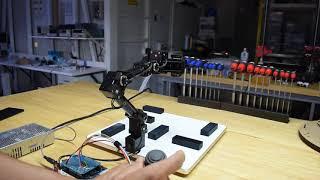 Robotic arm controlled with three axis joystick