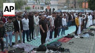 Muslims across Europe celebrate the end of Ramadan performing Eid prayers