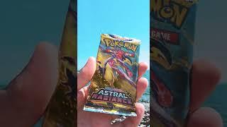 Opening Pokemon Cards by the Ocean 