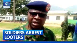 Soldiers Arrest Looters Of NYSC Camp Abuja