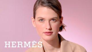 Applying your Rouge Hermès Poppy lip shine