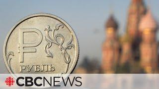 Russian ruble drops to record low after sanctions