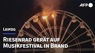 Riesenrad-Brand auf Festival bei Leipzig: 20 Verletzte | AFP