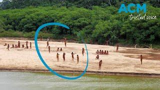 Rare footage captures world's most secluded tribe emerging from the Amazon