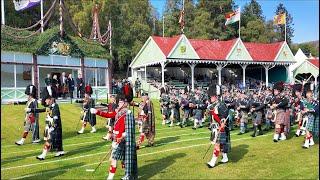 Drum Majors lead the massed pipes and drums with Atholl Highlanders at 2024 Braemar Gathering