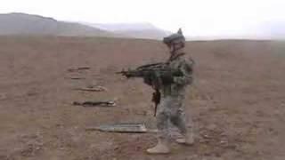 Army Soldier dual-wields some M249's