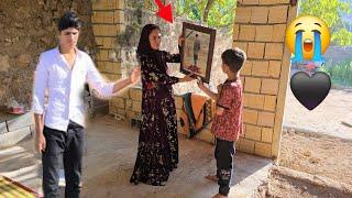 Preparation of a photo frame for Ibrahim's photo and a black dress for Ibrahim's mourning