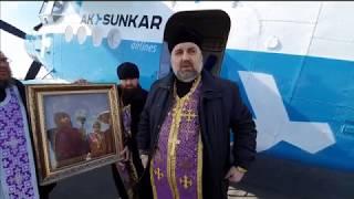 Священники Костаная облетели на самолете с  Казанской иконой Божией Матери г. Костанай и Рудный.