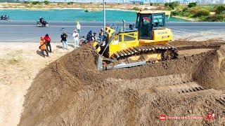 Amazing Shantui bulldozer push sand and dongfeng dump truck dumping sand filling a project huge land