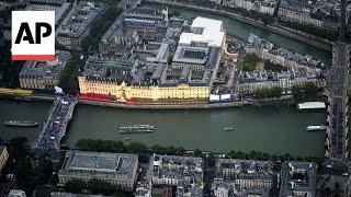 Olympics pre-race triathlon cancelled over River Seine water quality concerns | AP Explains