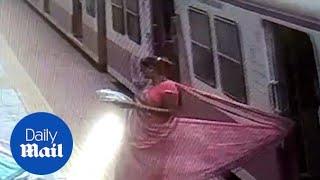 Horrifying moment women dragged after saree got stuck in train