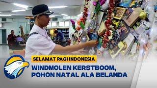 Universitas Kristen Petra Surabaya Membuat Pohon Natal dari Susunan Buku - [SELAMAT PAGI INDONESIA]