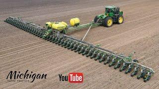 Huge John Deere DB120 48 row 30" 120' wide corn planter in action in Michigan!