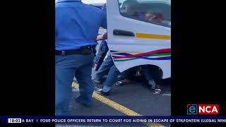 Police brutality | Video shows officers wrestling taxi driver to ground