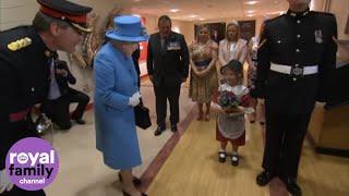 Little girl accidentally hit in the face by soldier after meeting the Queen