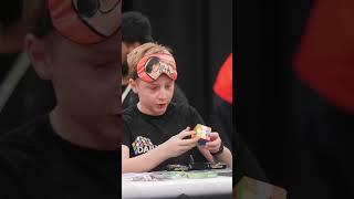 Fastest time to solve a 3x3x3 puzzle cube blindfolded - 12.10 seconds by Charlie Eggins 