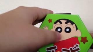 Eating and opening crayon shin chan biscuits