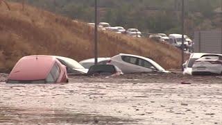 Flash floods overturn cars, wreak havoc in Spain